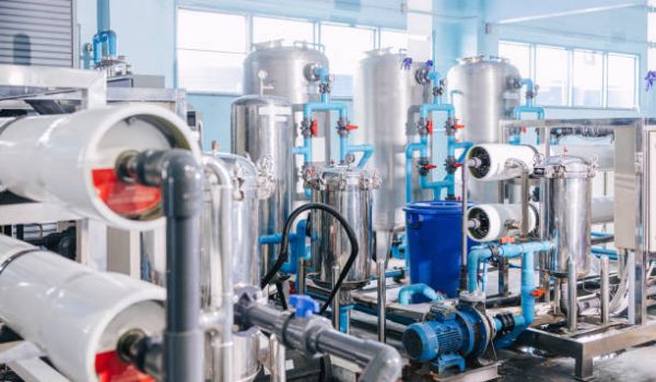 Water purity filtering system in drinking water plant, Food and drink factory clean water purification area.